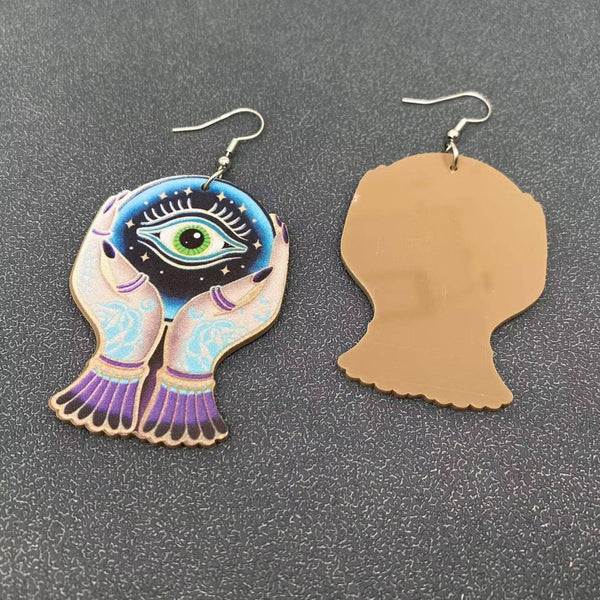 Holding Devil's Eye Crystal Ball Acrylic Dangle Earrings